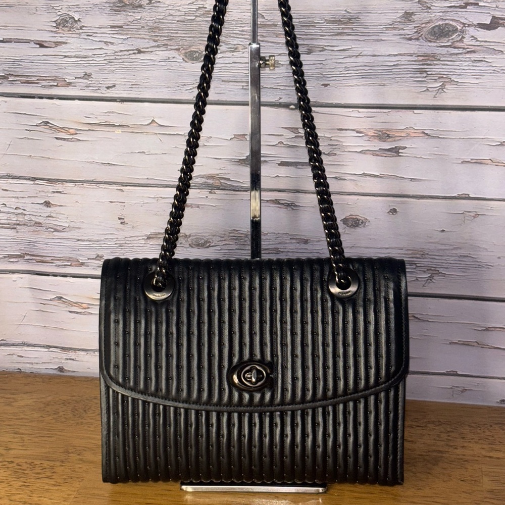 Coach Parker black leather  shoulder bag/ crossbody with quilting and rivets.